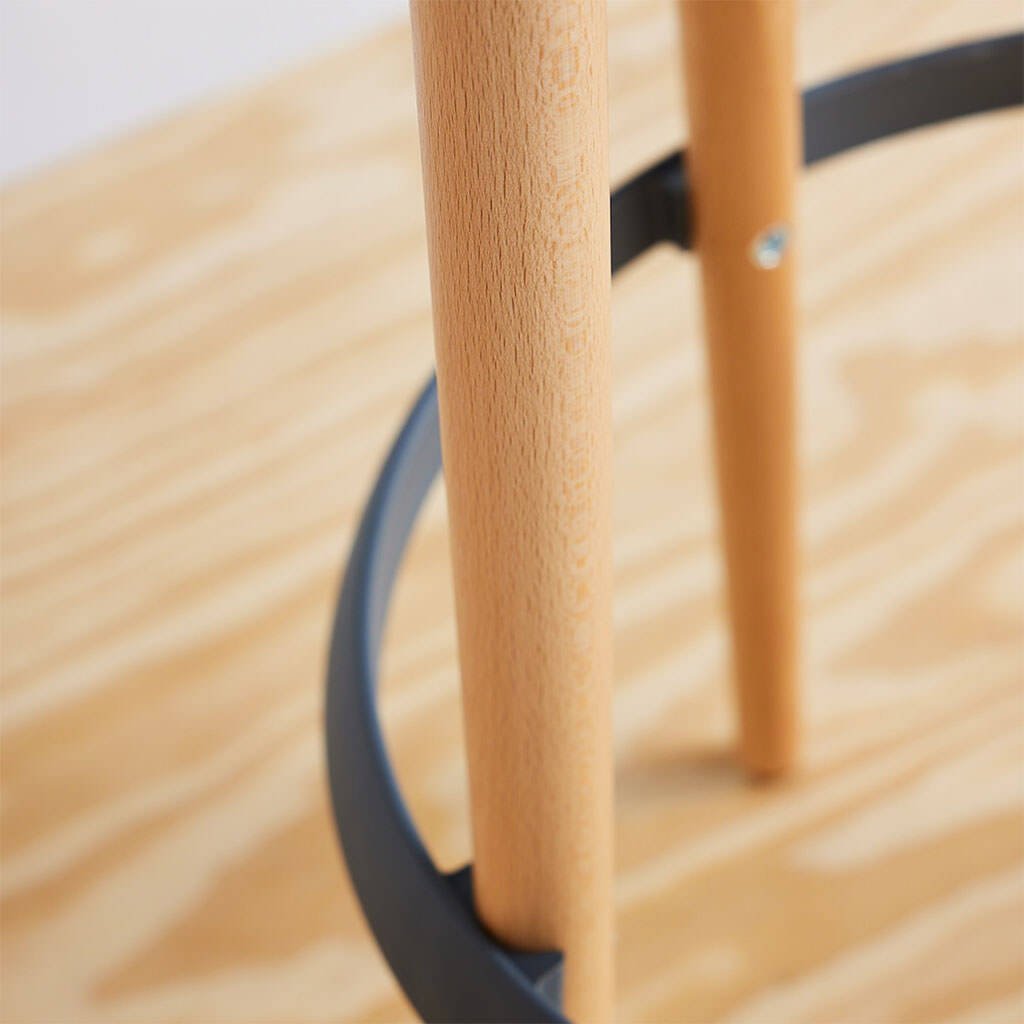 joi-stool-with-footring-close-up-beech-wood-leg