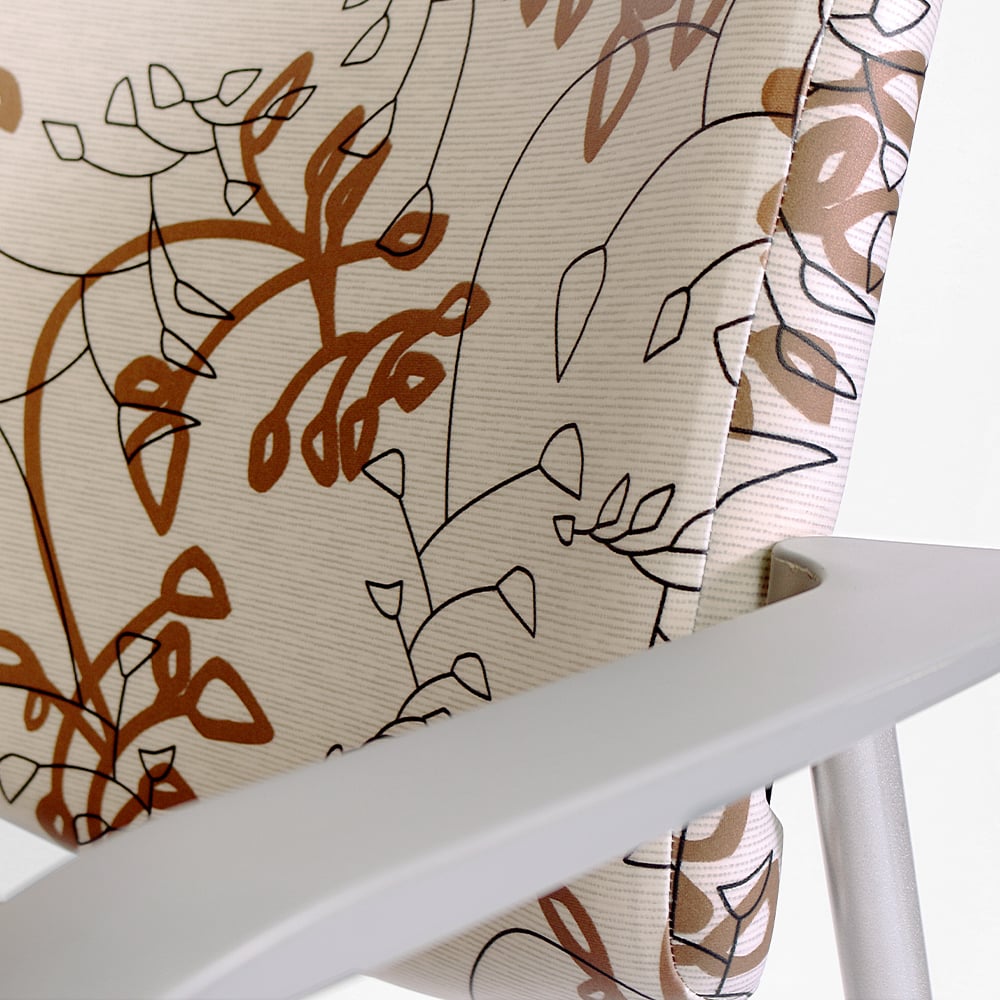 close-up-upholstered-back-grey-arm