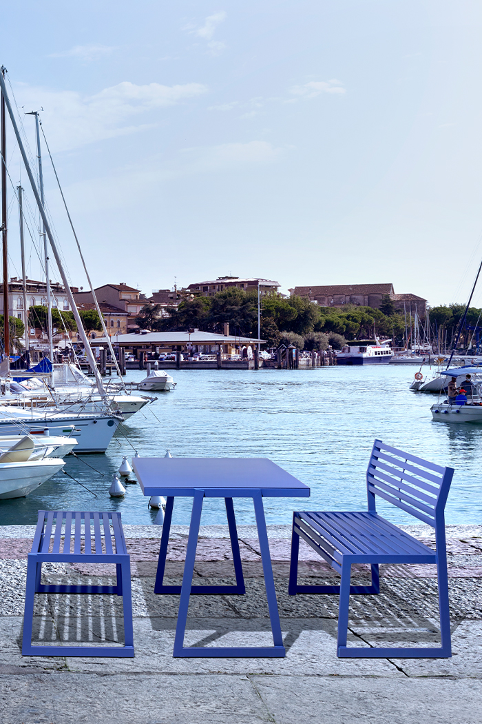 cortina-blue-benches-and-table-on-boardwalk